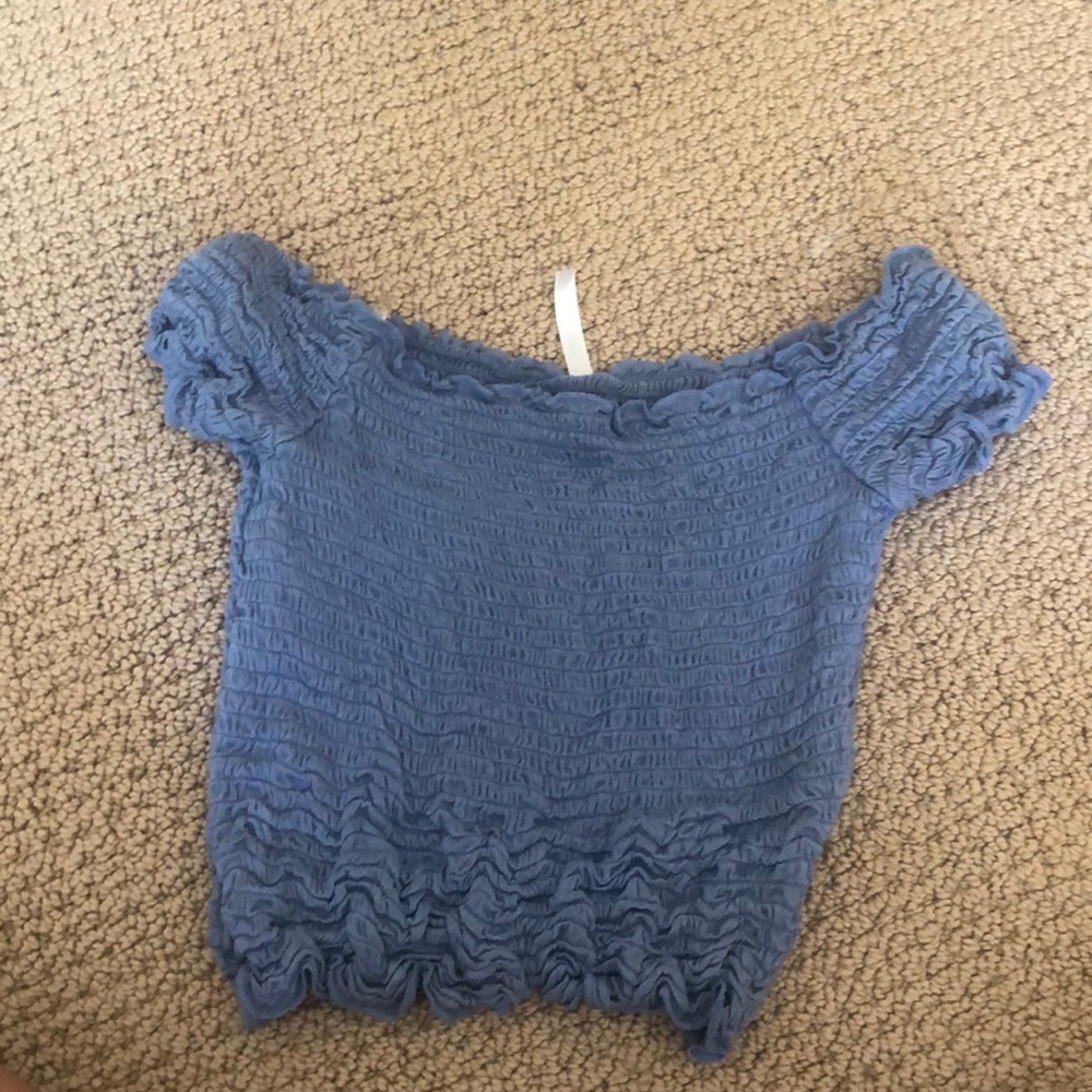 blue ruffle off the shoulder shirt